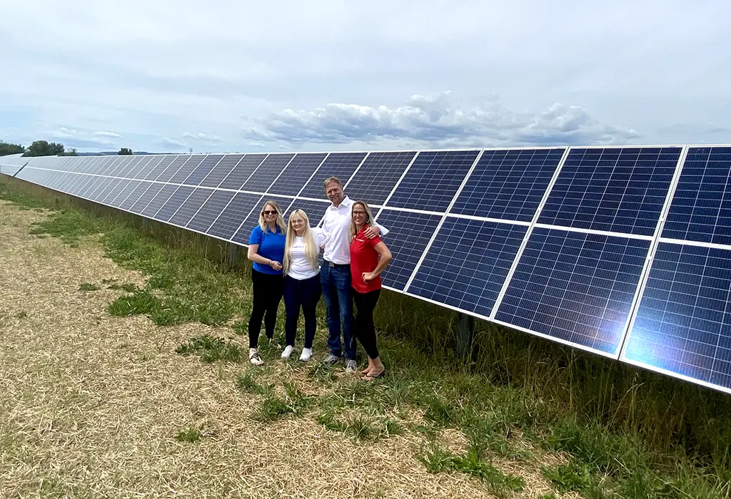 Solar On Earth leadership team members with partner-developer at solar farm in NY